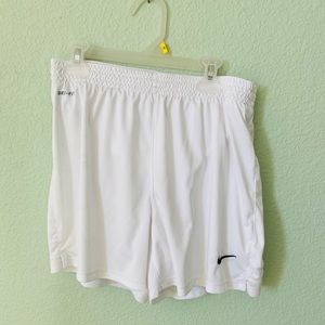 White Nike women’s soccer shorts